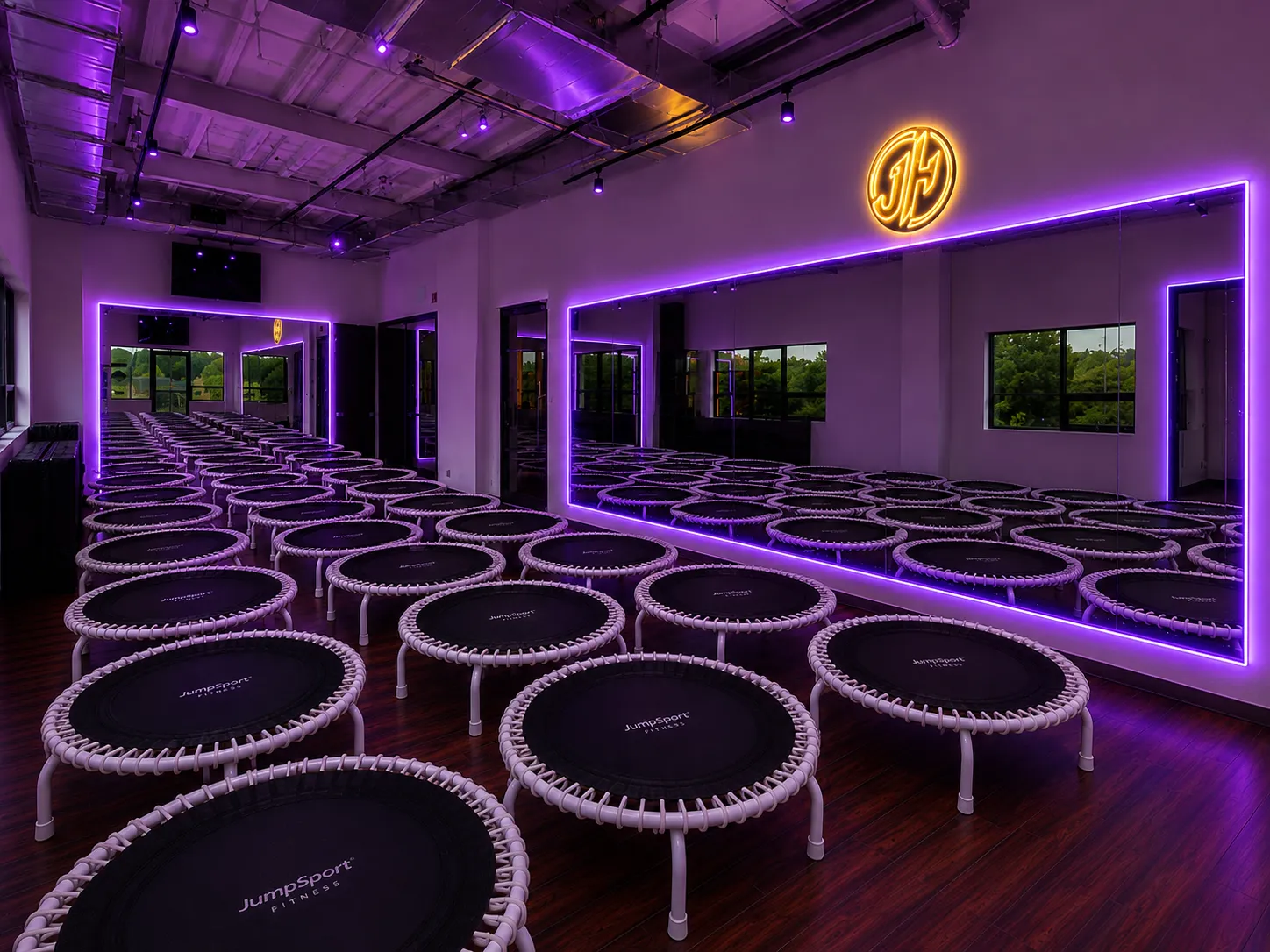 The JumpHaus studio bathed in violet neon light